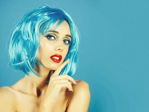 Girl with bright artificial hair. - 写真・画像