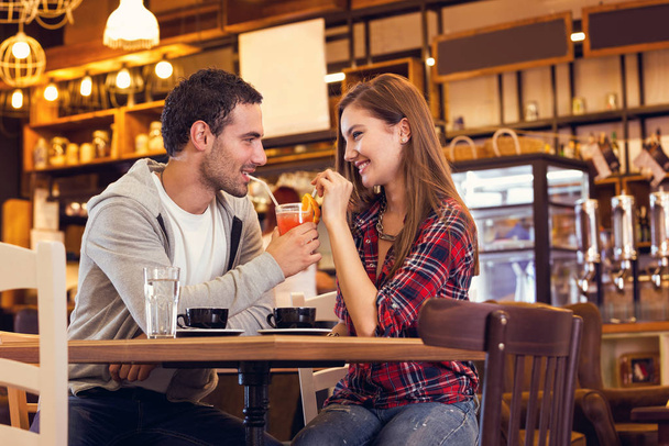 Man and woman dating at restaurant - Фото, изображение