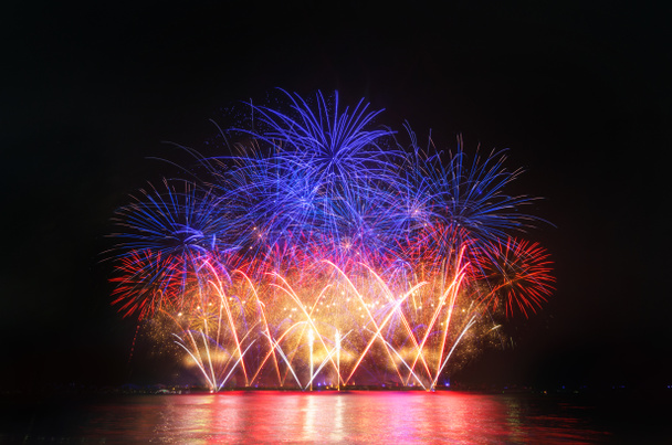 Colorful fireworks on the black sky background. - Photo, Image
