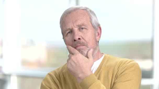 Portrait of pensive elderly man. - Footage, Video