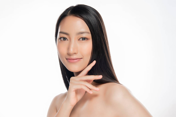 Beautiful Young asian Woman with Clean Fresh Skin look. Girl beauty face care. Facial treatment. Cosmetology, beauty and spa. - Fotografie, Obrázek