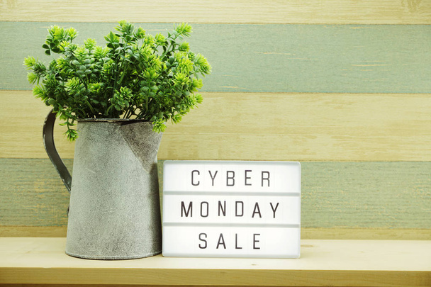 Cyber Monday sale shopping concept alphabet letter and alarm clock on wooden background - Valokuva, kuva