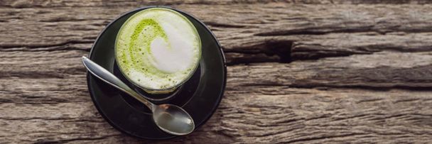 Cup of matcha latte against the old wooden table BANNER, LONG FORMAT - Foto, immagini