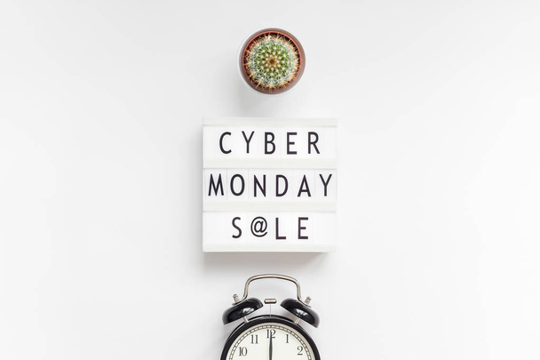 Creative Top view flat lay promotion composition Cyber Monday sale text on lightbox alarm clock white background copy space Template Cyber Monday sale mockup fall thanksgiving promotion advertising - Photo, Image