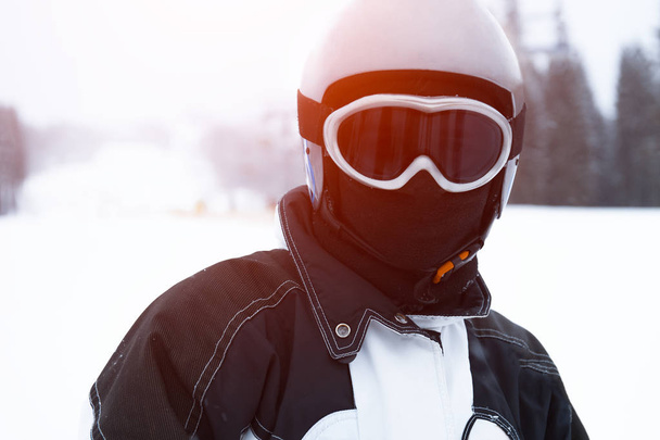 Portrait of teenager skier on snowy mountain. - Фото, зображення