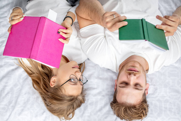 reading young family. before the sleep. reading habit - Foto, Bild