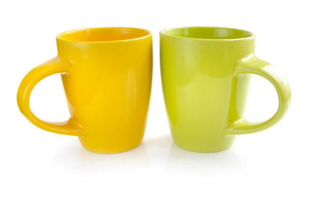 Deux tasses à thé sur fond blanc
 - Photo, image