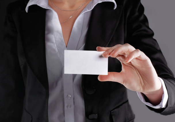 close up.business woman showing blank business card.isolated on  - Фото, зображення