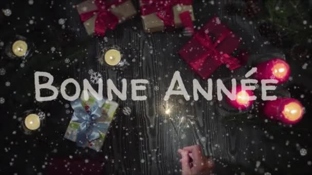 Animatie Bonne Annee - Gelukkig Nieuwjaar in het Frans, vrouwelijke hand met een sterretje - Video