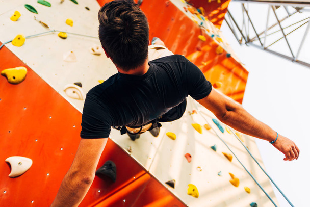 Active lifestyle and bouldering climbing, reaching the top concept - Fotó, kép