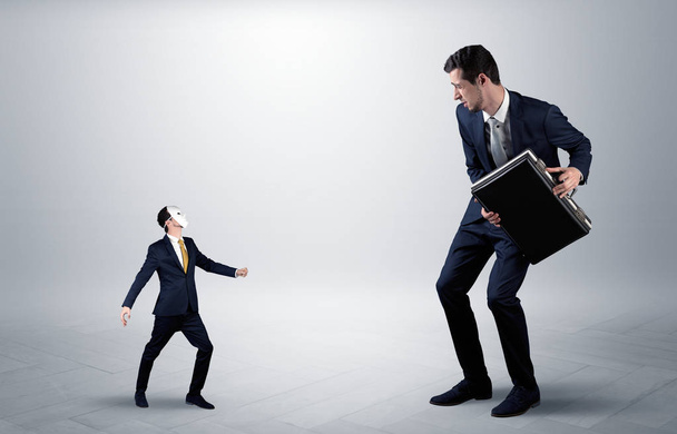 Conflict between small and big businessman - Фото, изображение