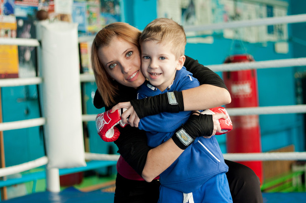 Family portrait. Mother and son in the gym - Valokuva, kuva