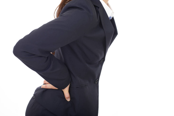 Business woman who has a back pain - Photo, Image