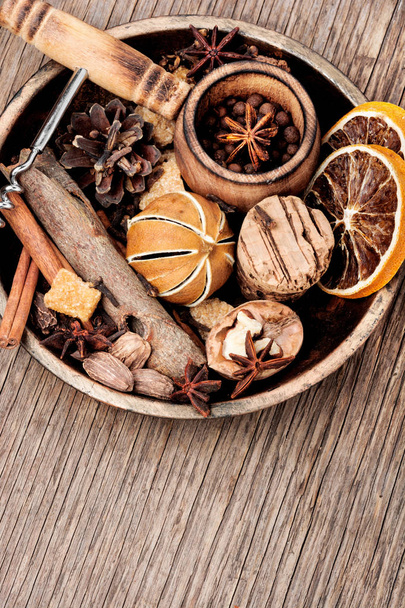 Ingredients for mulled wine on a rustic background.Winter drink mulled wine - Photo, Image