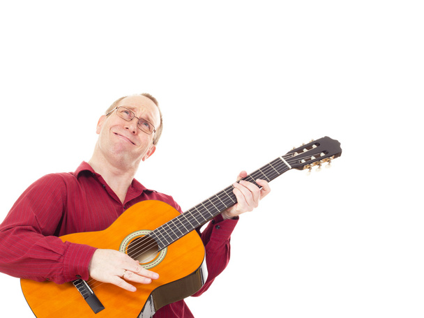 человек играет на гитаре - Фото, изображение