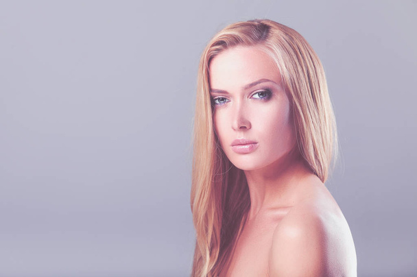 Portrait of beautiful woman on white background - Fotografie, Obrázek