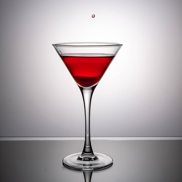 glass of wine on the glass table - Fotografie, Obrázek