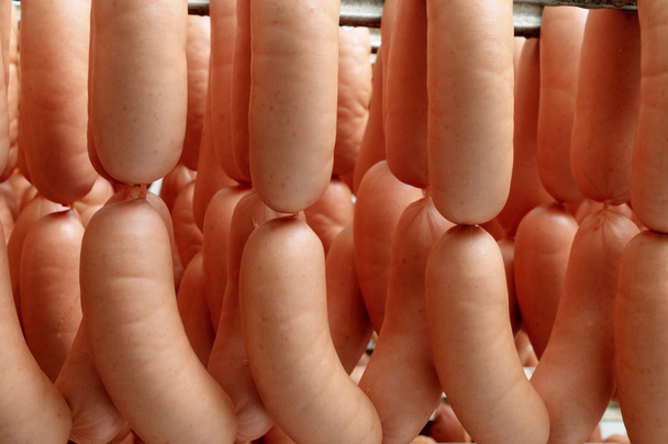 колбаса висит на складе
 - Фото, изображение