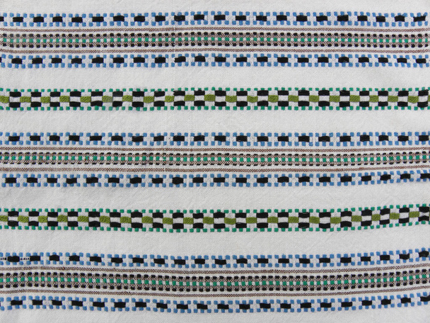 Bordado popular ucraniano, patrón bordado en tela blanca
                                   - Foto, imagen