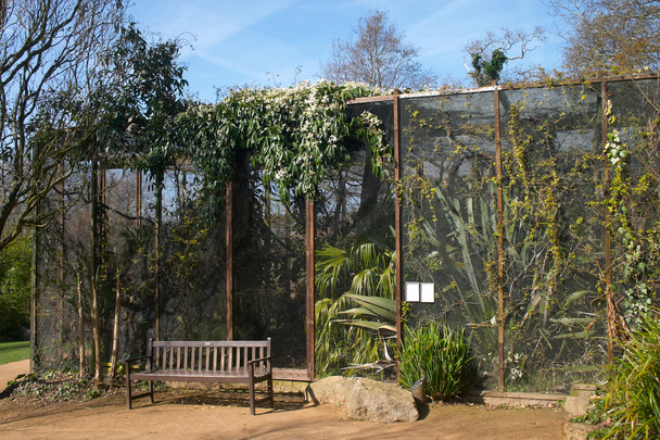 Birdcage with plant in a zoo - Photo, Image
