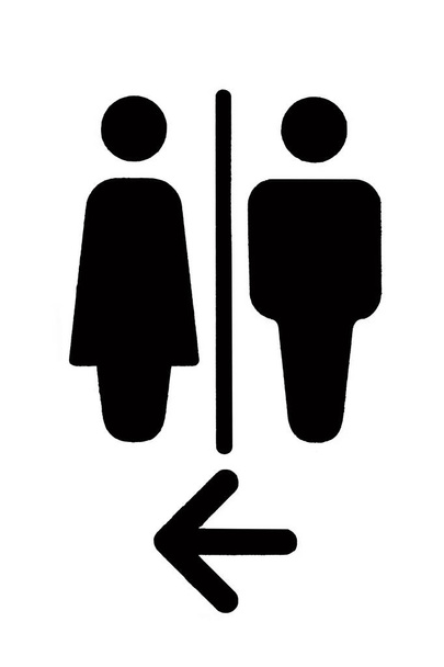 Een WC-teken voor de mannen en vrouwen close-up op een witte achtergrond. - Foto, afbeelding