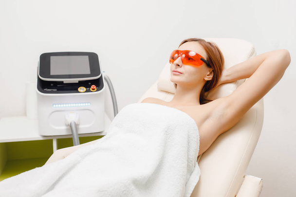 Underarm laser hair removal treatment. Body care - Photo, Image