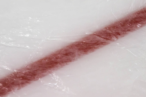 Hokej na lodzie lodowisko czerwonych oznaczeń zbliżenie, winter sport tło - Zdjęcie, obraz