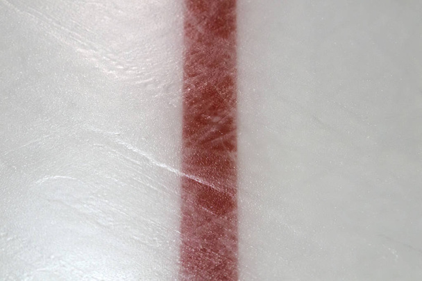 Hokej na lodzie lodowisko czerwonych oznaczeń zbliżenie, winter sport tło - Zdjęcie, obraz