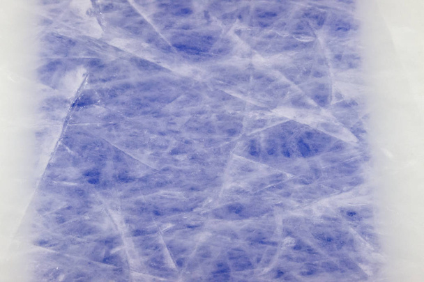 ice background with marks from skating and hockey, blue texture - Photo, Image