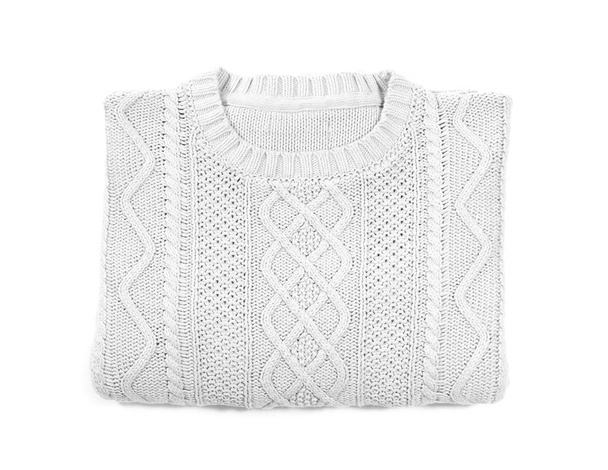 Folded cozy warm sweater on white background, top view - Foto, afbeelding