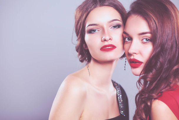 Two young beauty women standing together . Two young beauty wome - Fotografie, Obrázek