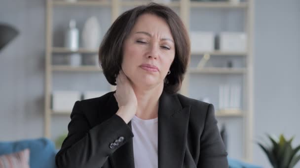 Old Businesswoman with Neck Pain at Work - Footage, Video