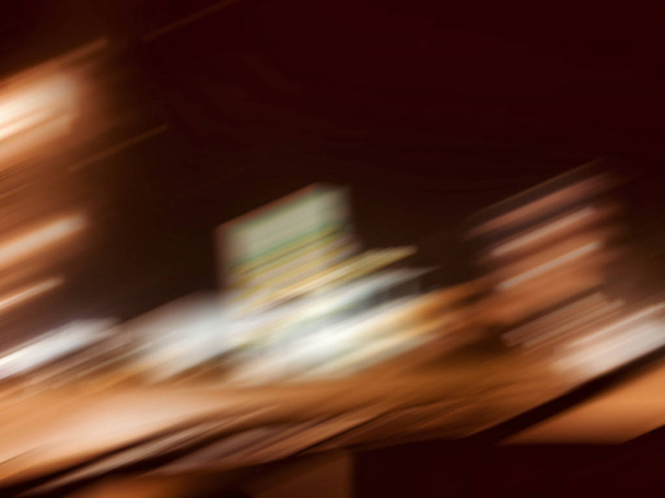 Abstract motion blur effect. The lights of the streets. View from the car - Φωτογραφία, εικόνα