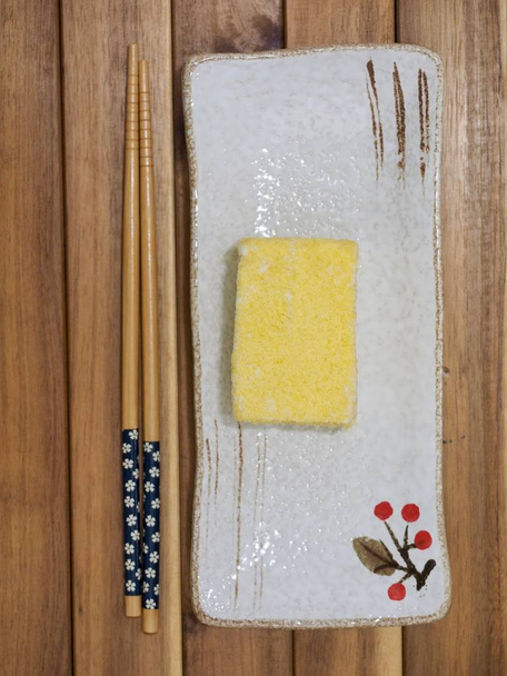 Comida coreana Pastel de arroz con calabaza
 - Foto, imagen