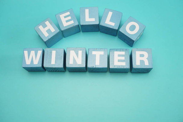hello winter alphabet letter on blue background - Фото, изображение