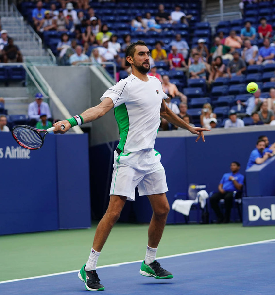 NEW YORK - SEPTEMBER 3, 2018: Grand Slam Champion Marin Cilic of Croatia in action during his 2018 US Open round of 16 match at Billie Jean King National Tennis Center  - Photo, Image