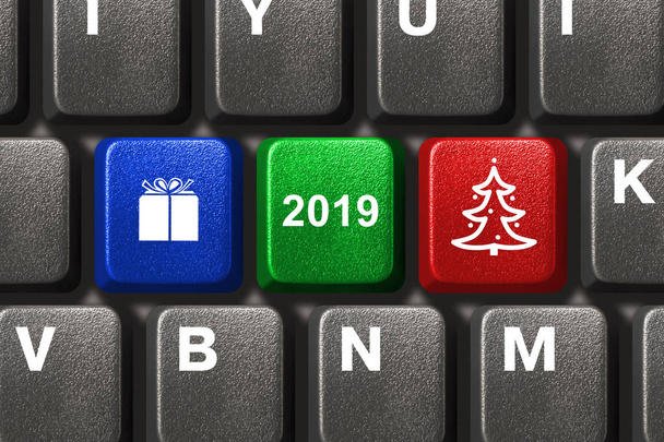 Computer keyboard with Christmas keys - holiday concept - Foto, afbeelding