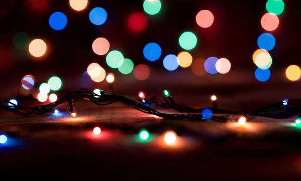 Colorful Christmas lights blurred background - Valokuva, kuva