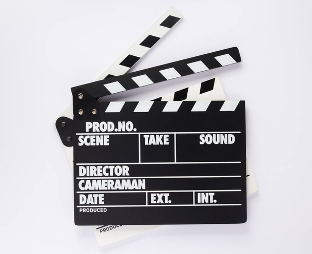 movie clapper board on white  background, top view - Foto, imagen
