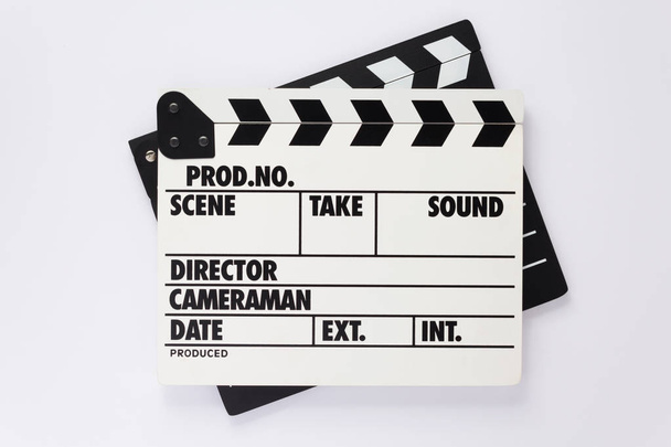 movie clapper board on white  background, top view - Zdjęcie, obraz
