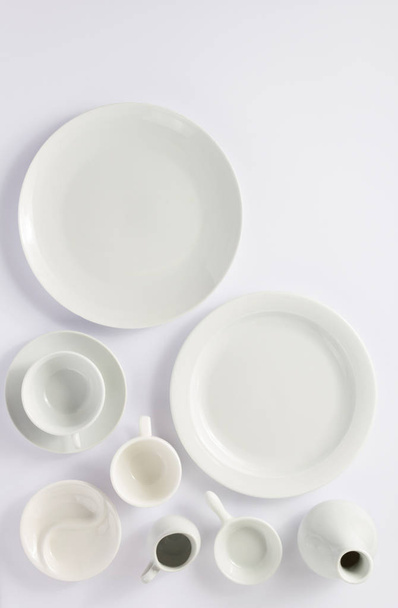 set of dishes on white background, top view - Zdjęcie, obraz
