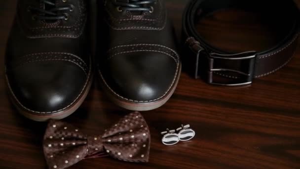 Mens accessories, butterfly shoes cufflinks and belt. - Footage, Video