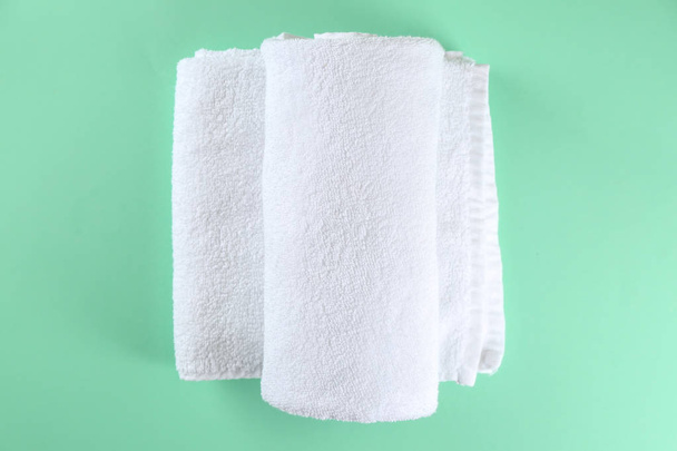Soft towels on color background - Photo, Image