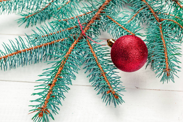 Christmas background, pine tree branches with decoration - Fotó, kép