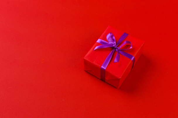 close up of gift box on color background - Foto, Imagem