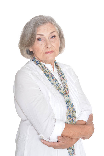 portrait of beautiful senior woman, posing against white background - Фото, изображение