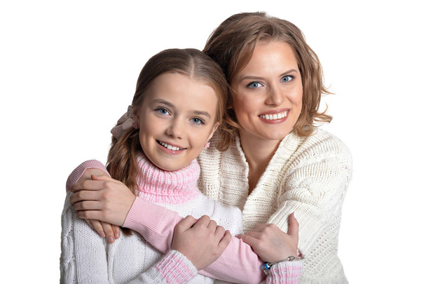 Portrait of happy mother and daughter isolated on white background  - Foto, imagen