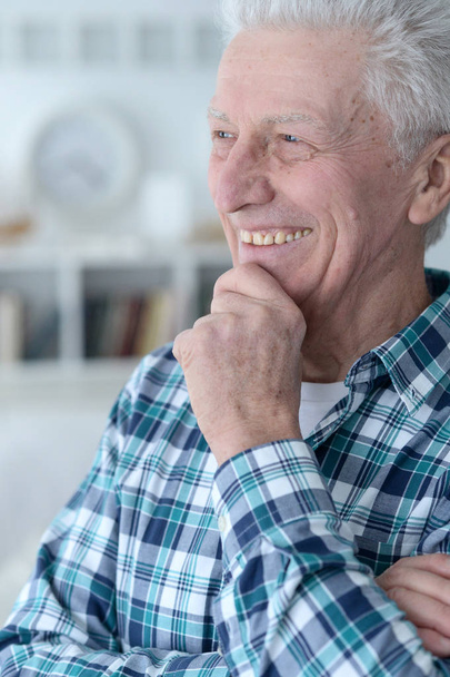 Portrait of happy senior man at home - Photo, Image