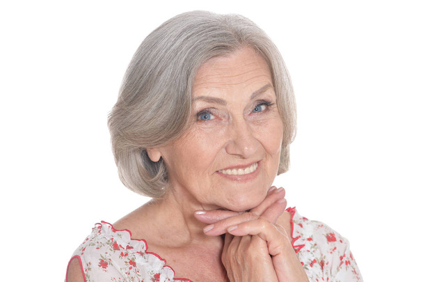 portrait of beautiful senior woman, posing against white background - Foto, imagen