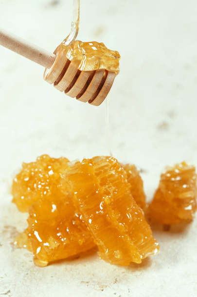 sweet honey on table, natural food - 写真・画像